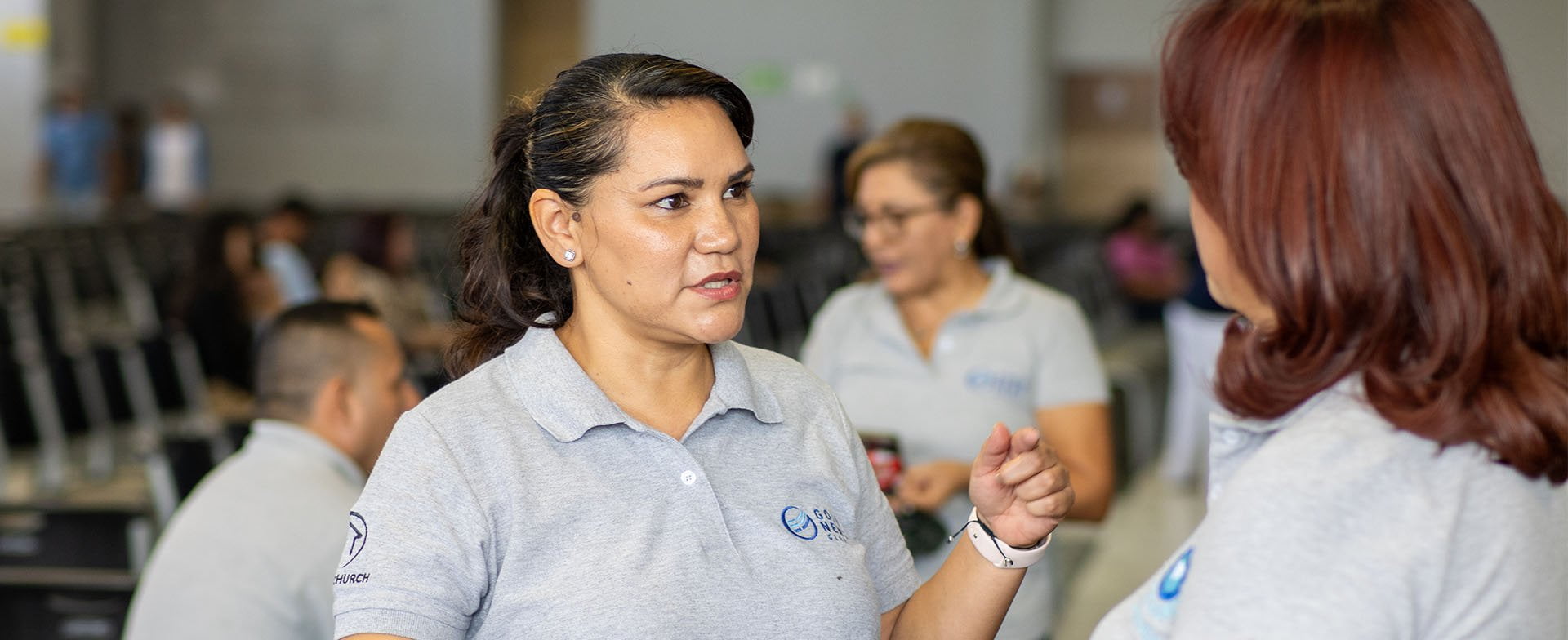 Good News Global workers working together in the field